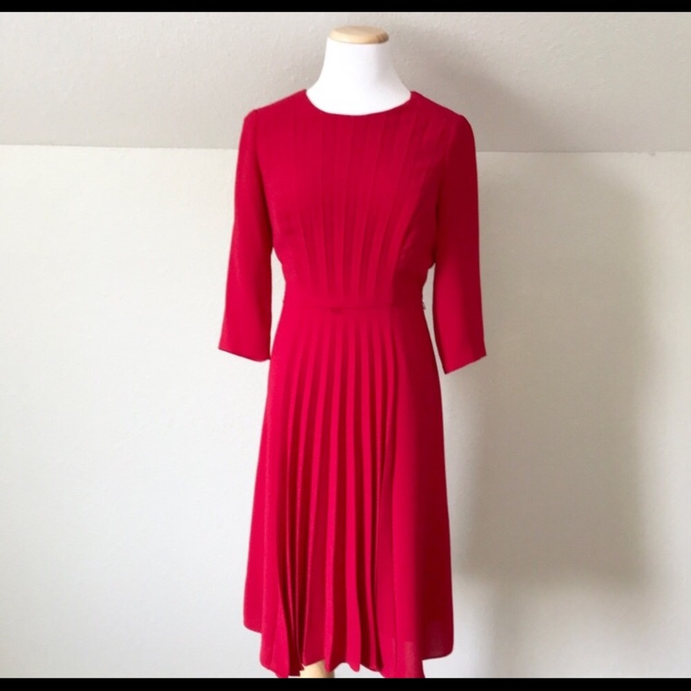 Pleated midi dress. Red dress